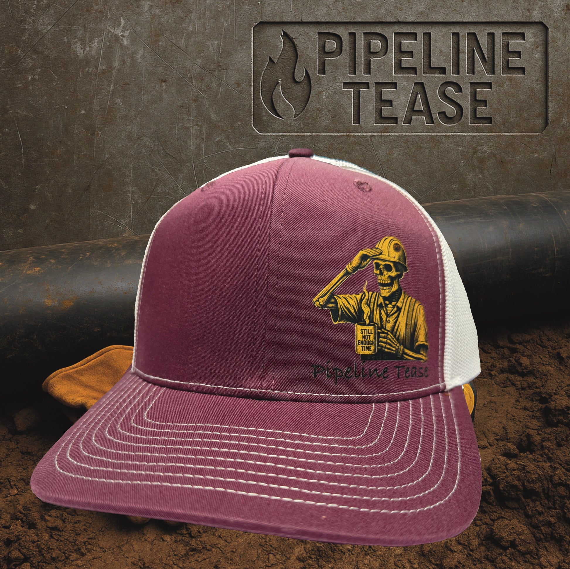 Maroon and white trucker hat featuring the Pipeline Tease color Still Not Enough Time logo holding a coffee cup, displayed on a dirt jobsite background with Pipeline Tease branding.