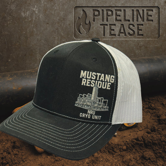 Black and white trucker hat with Mustang Residue NRU Cryo Unit design, displayed on dirt jobsite background with Pipeline Tease branding.